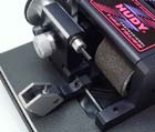 Covered slicing needle for tire width cutting. (Extremely sharp needle is covered in alu holder.)