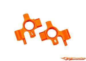 Traxxas Steering blocks, 6061-T6 aluminum (orange-anodized), left & right (4) 10537-ORNG
