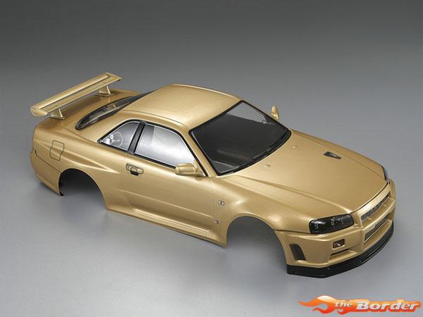 KillerBody Nissan Skyline R34 195mm Pre-Painted Gold Body for 1/10 48645 - Afbeelding 3